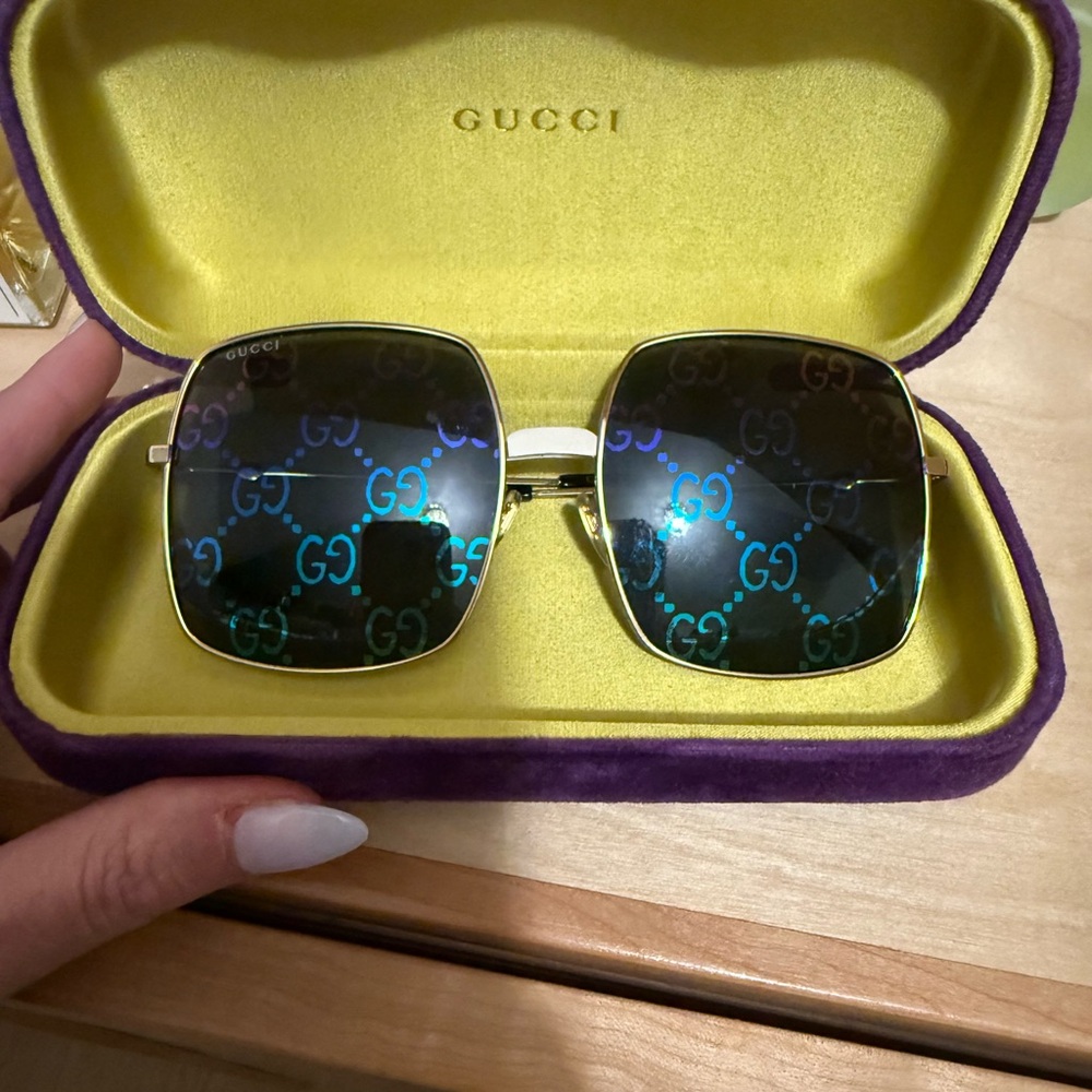 Gucci Gold Frame Sunglasses with Blue Lens